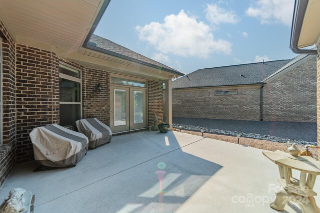 view of patio with french doors and grilling area