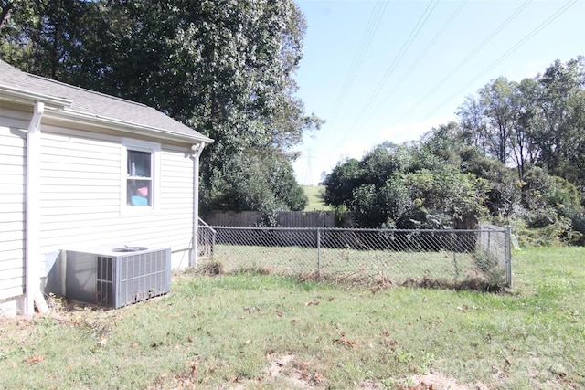 view of yard with central AC unit