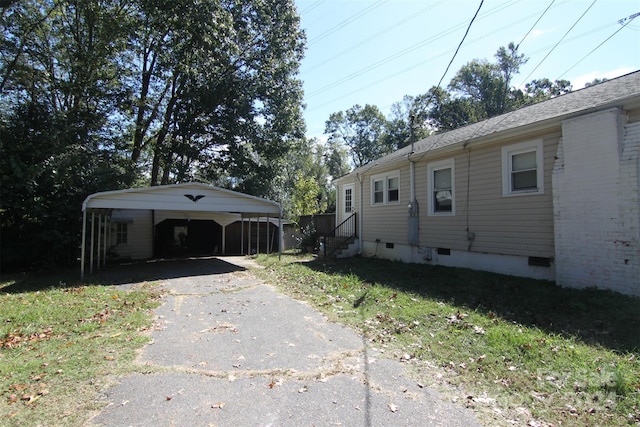 view of home's exterior featuring a yard