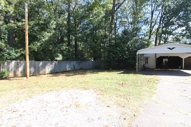 view of yard with a carport