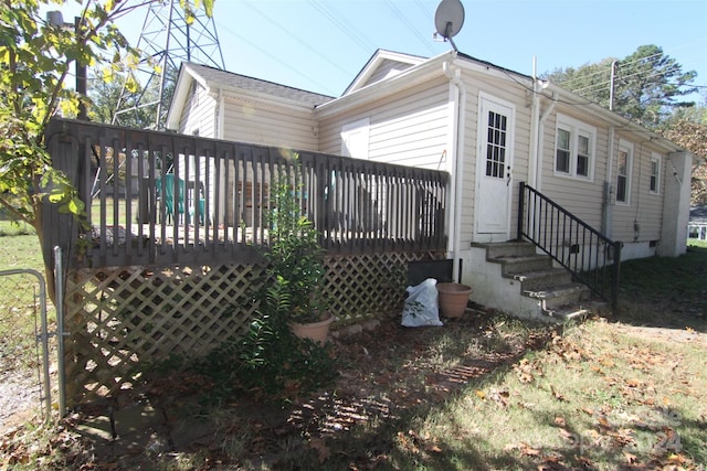 rear view of house with a deck