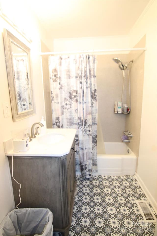 bathroom with vanity and shower / bath combo