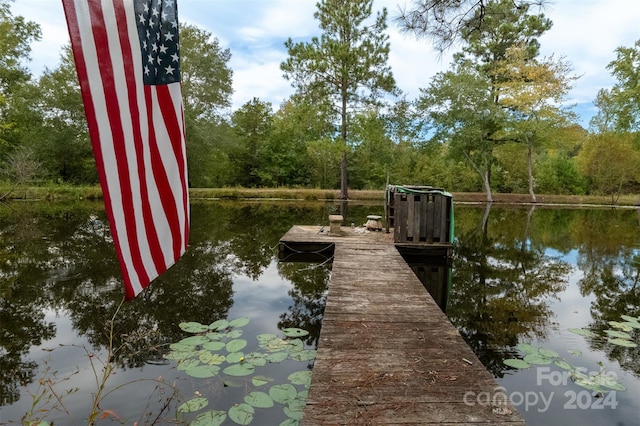 view of dock featuring a water view