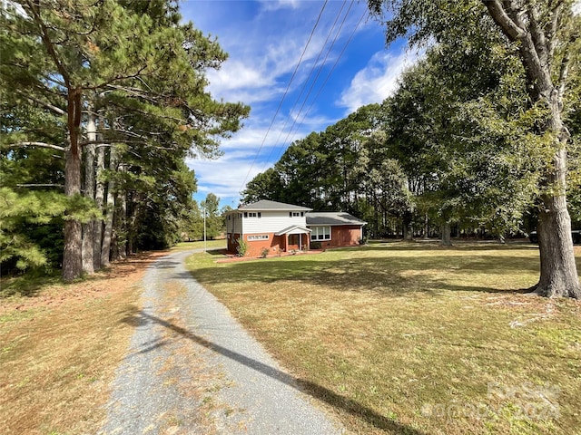 view of front of home with a front lawn