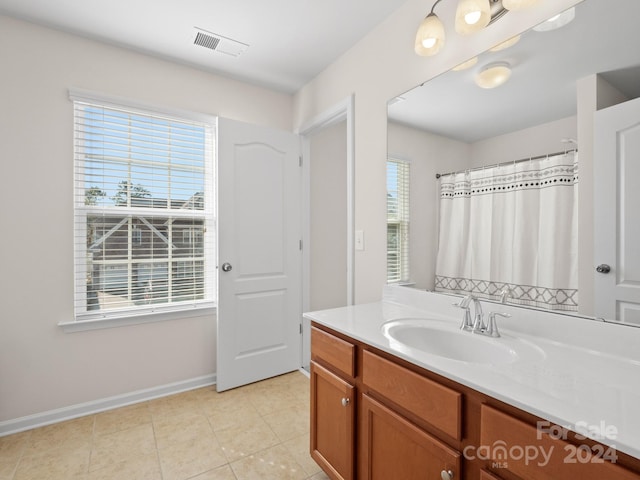 bathroom featuring vanity and tile patterned floors