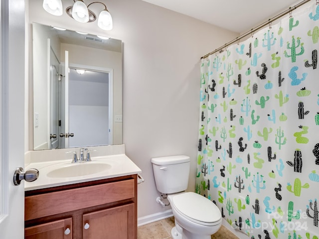 bathroom featuring vanity, a shower with shower curtain, toilet, and tile patterned flooring