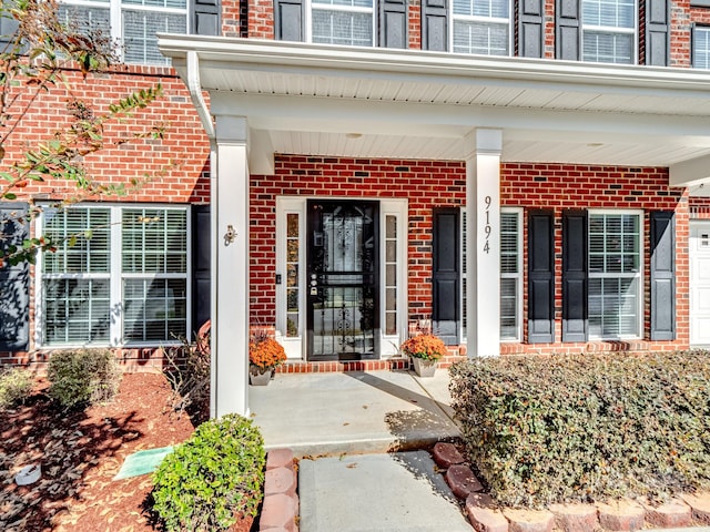 entrance to property with covered porch