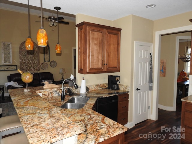 kitchen featuring dishwasher, dark hardwood / wood-style floors, kitchen peninsula, sink, and ceiling fan