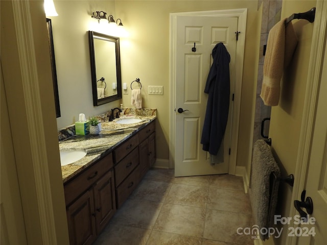 bathroom featuring vanity and tile patterned flooring