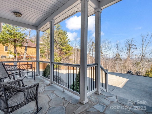 sunroom with plenty of natural light