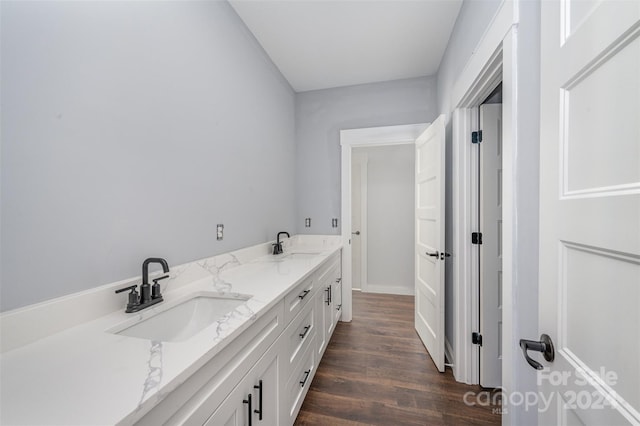 bathroom featuring vanity and wood-type flooring