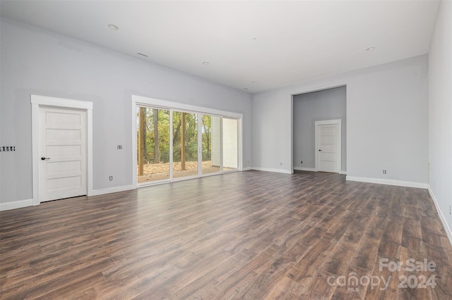 empty room featuring dark hardwood / wood-style floors