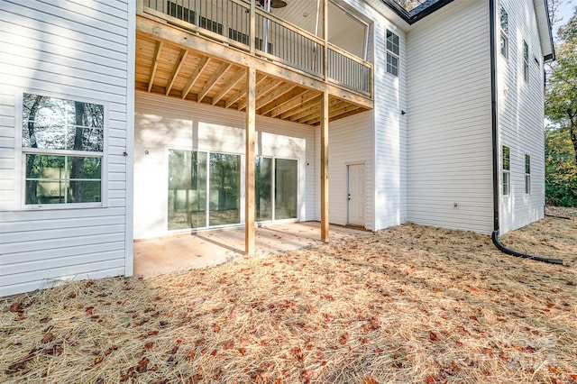 exterior space with a patio area and a balcony