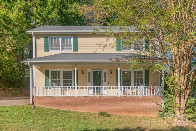 view of front property with covered porch