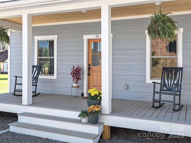 wooden terrace with covered porch