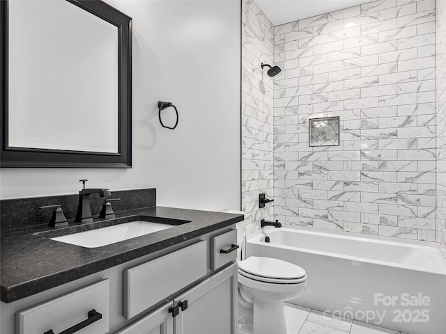 full bathroom with vanity, toilet, and tiled shower / bath