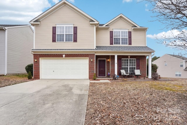 view of front of property with a garage