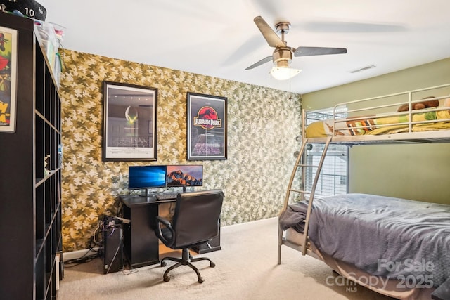 carpeted bedroom featuring ceiling fan