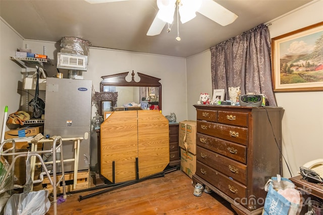 miscellaneous room with ceiling fan and light wood-type flooring