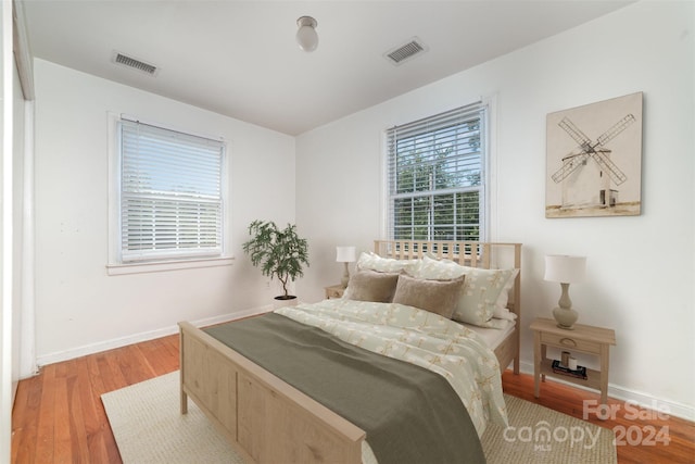 bedroom featuring light wood-type flooring