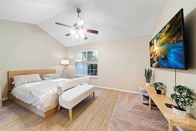 bedroom featuring lofted ceiling, ceiling fan, and carpet floors