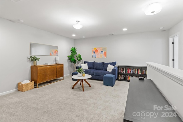 living room with light colored carpet