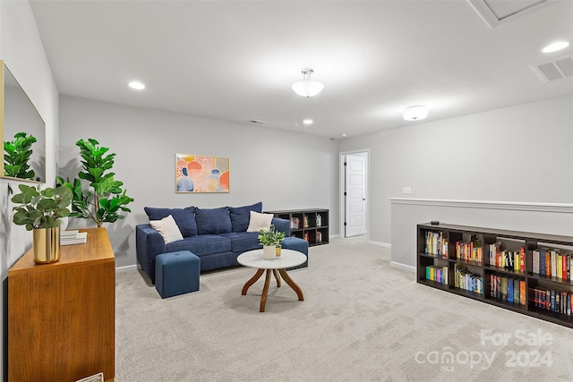 living room featuring light colored carpet