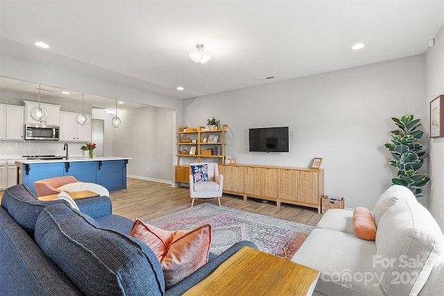 living room featuring light hardwood / wood-style flooring