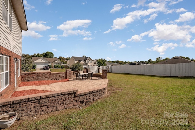 view of yard with a patio area