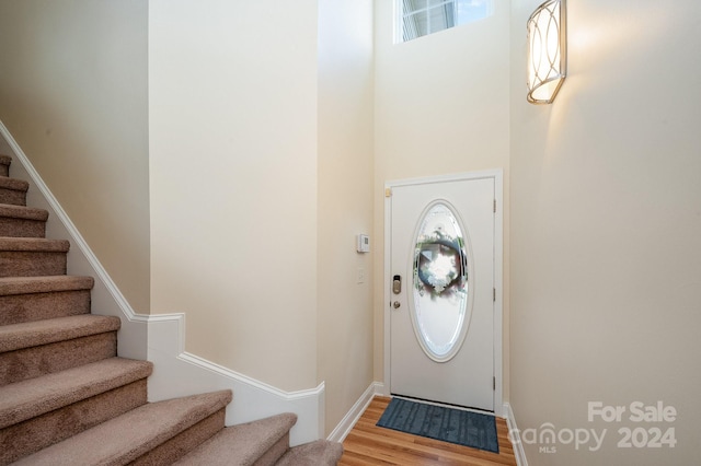 foyer entrance with hardwood / wood-style floors