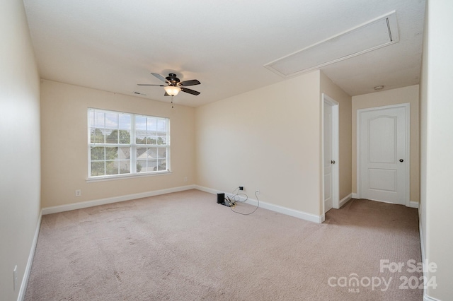 carpeted empty room with ceiling fan