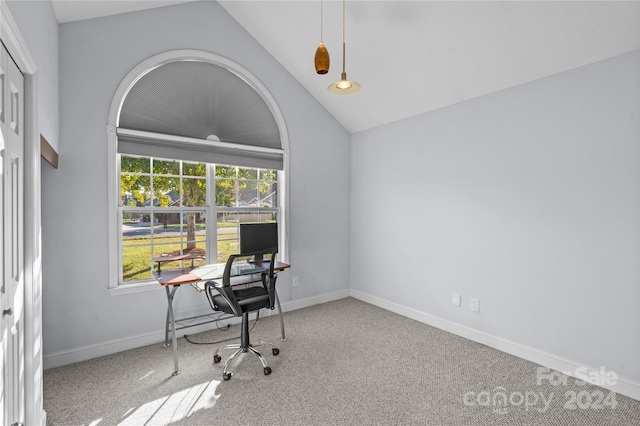 home office with lofted ceiling and carpet