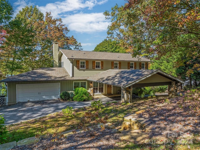 view of front of property featuring a garage and covered porch