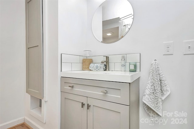 bathroom with vanity and hardwood / wood-style flooring