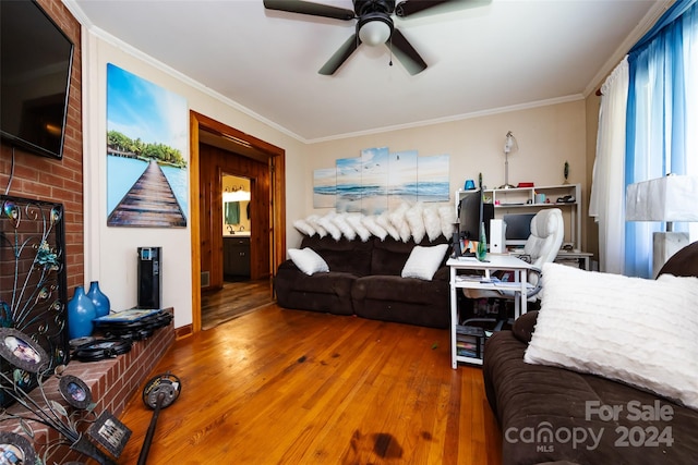 living room featuring crown molding, ceiling fan, and hardwood / wood-style floors