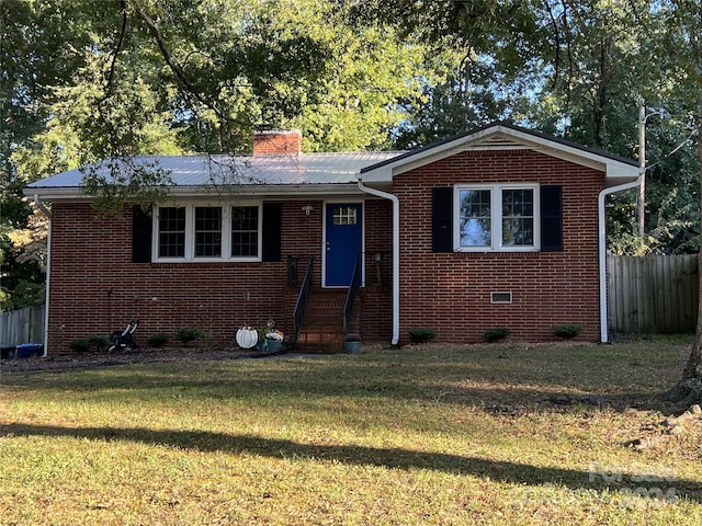 view of front of home with a front yard