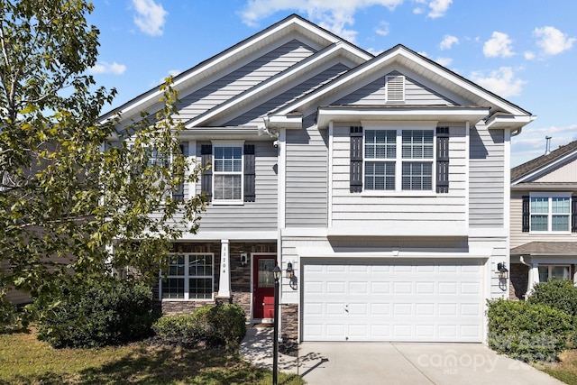 view of front of property featuring a garage