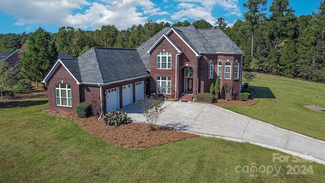 view of property featuring a front yard