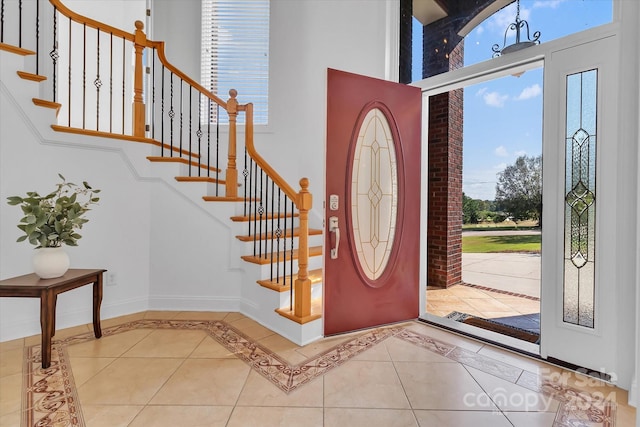 entrance foyer featuring light tile patterned flooring