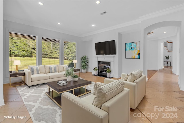 tiled living room with crown molding