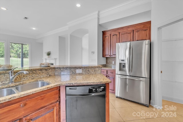 kitchen featuring crown molding, sink, stainless steel appliances, light stone countertops, and light tile patterned floors