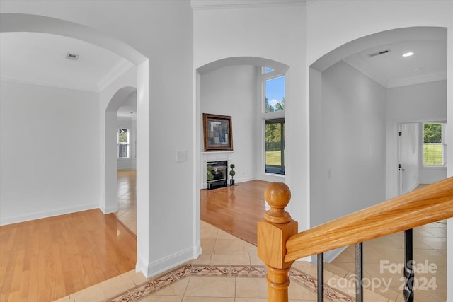 hallway featuring light hardwood / wood-style floors and a wealth of natural light