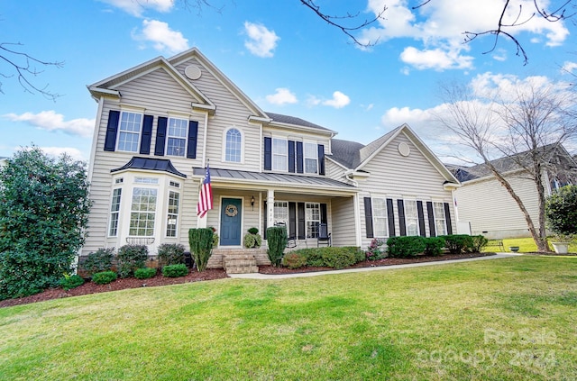 view of front of home featuring a porch and a front yard