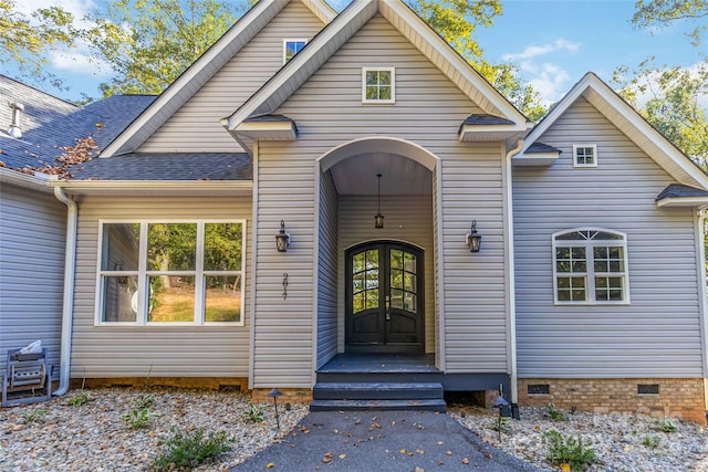 entrance to property featuring french doors