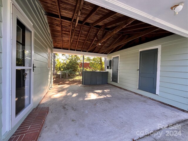704 Mcadenville Rd, Lowell, NC 28098 - view of patio / terrace with a carport