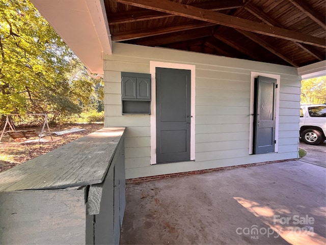 property entrance featuring a patio area