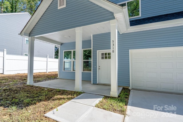 entrance to property with a garage