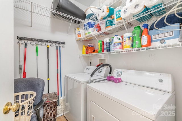 laundry area with washing machine and dryer