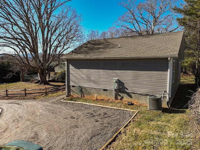 view of home's exterior with cooling unit