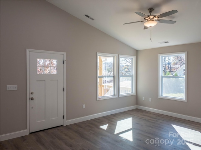 entrance foyer featuring ceiling fan, dark hardwood / wood-style flooring, and vaulted ceiling